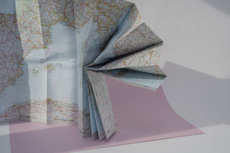 Folded textile samples in soft coordinated colors.
